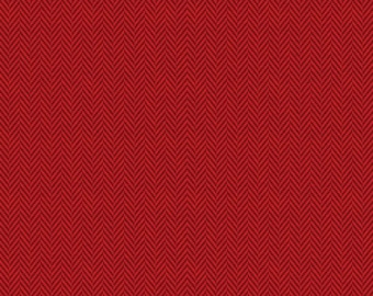 Pode incluir: Tecido vermelho com padrão espinha de peixe. O tecido é texturizado e tem um brilho sutil.