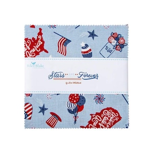 May include: A blue and red fabric square with a patriotic theme. The fabric features stars, stripes, fireworks, balloons, and the words "Stars and Stripes Forever".