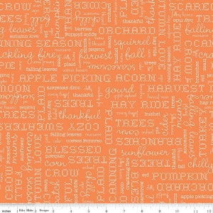May include: Orange fabric with a white pattern of words related to autumn and fall. The words include "harvest", "fall", "pumpkin", "apple picking", "trees", "cider", "corn", "sunflower", "blessed", "thankful", and more.