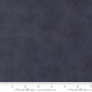 May include: A solid navy blue fabric with a subtle texture. The fabric is evenly colored and appears to be a medium weight material. A ruler is at the bottom of the image.