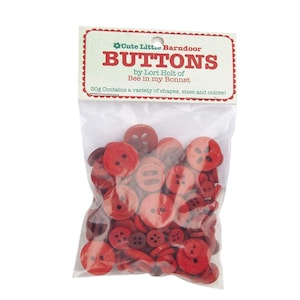 May include: A bag of 30 grams of red buttons in various shapes and sizes. The bag is labeled "Cute Little Barndoor Buttons by Lori Holt of Bee in my Bonnet".