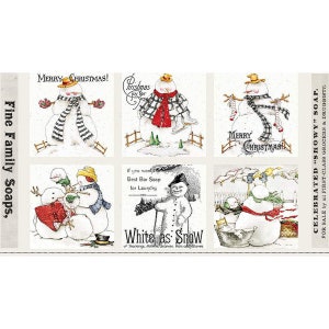 May include: A vintage-style illustration of a snowman with a plaid scarf and hat, holding a sign that reads "Christmas Joy for You". The illustration is surrounded by a white border and the text "Fine Family Soaps" is visible in the background.