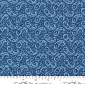May include: Blue paisley fabric with a white paisley pattern. The fabric is 44 inches wide and is perfect for quilting, crafts, and home decor.