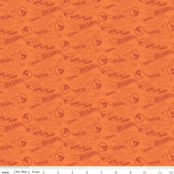 100% Cotton Licensed Fabric - Hot Wheels Badges - 43' 100% Cotton Licensed Fabric - Hot Wheels Badges - 43'