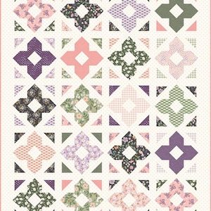 May include: A quilt pattern with a repeating design of a floral print square surrounded by four triangles. The quilt is made with a variety of floral fabrics in shades of pink, purple, green, and white.