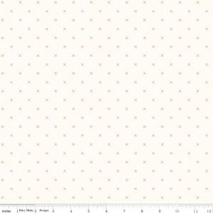 May include: White fabric with a repeating pattern of small brown crosses. The fabric is 12 inches wide.