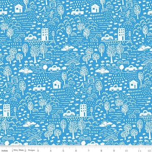 May include: Blue and white fabric with a repeating pattern of houses, cars, trees, and clouds. The design includes bridges, buildings, and suns, creating a whimsical landscape scene. The fabric is suitable for various craft projects.