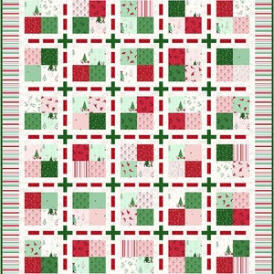 May include: A white quilt with a red and green patchwork design. The quilt is made up of squares with different Christmas-themed patterns, including trees, snowflakes, and Santa hats. The quilt is edged with a red and green striped border.