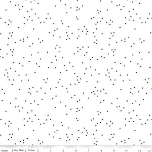 May include: White fabric with a scattered pattern of small, dark blue squares.