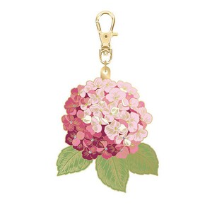May include: A gold-colored metal keychain with a detailed hydrangea flower charm. The flower features shades of pink and magenta petals, green leaves, and a gold-colored clasp.