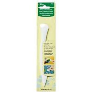 May include: White plastic tool for pressing seams and turning fabric corners. The tool is packaged on a yellow and green card with the text "Oliver Fold & Press Turner Point & Plier in 1 Tool Sharply Points & Turns Professionally".