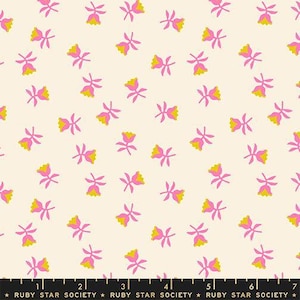 May include: Cream-colored fabric with a repeating pattern of pink and yellow stylized flowers. The flowers have pink petals and yellow centers. The fabric is from Ruby Star Society.