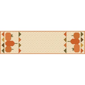 May include: A rectangular fabric table runner featuring a cream-colored center with a small brown floral pattern. The ends display orange pumpkin motifs with green stems and small triangular accents in shades of orange, yellow, and dark green.