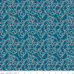 May include: A teal blue fabric with a white, pink, yellow, and blue string of lights pattern. The lights are in a continuous loop and are arranged in a random pattern.