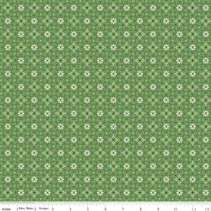 May include: A green fabric with a repeating pattern of white flowers and brown vines. The fabric is a repeating pattern of small white flowers and brown vines.