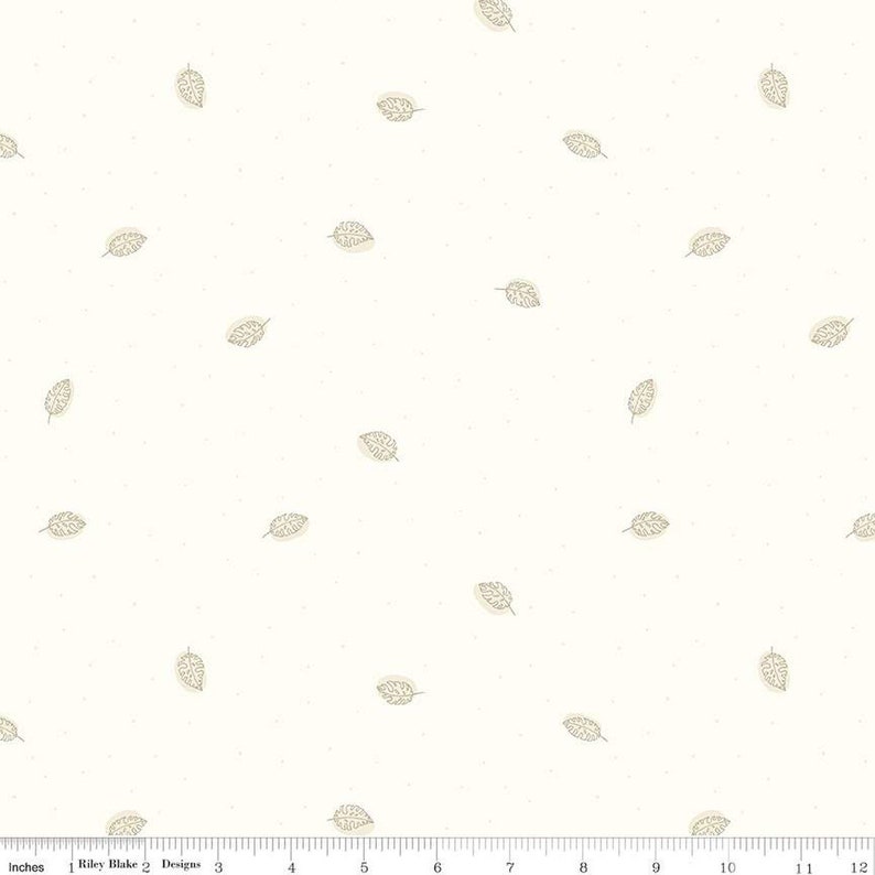 Puede incluir: Una tela blanca con un patr&oacute;n repetitivo de hojas beige. La tela es texturizada y tiene un aspecto sutilmente moteado.