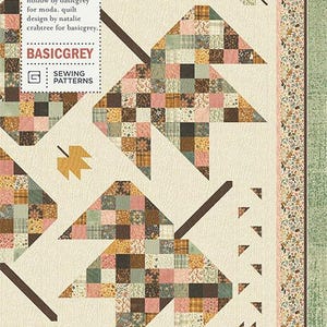 May include: A quilt pattern titled "Fallen Leaves" featuring a design of stylized leaves in shades of brown, pink, and green. The quilt has a cream-colored background and a floral border. The pattern is by Natalie Crabtree for BasicGrey.
