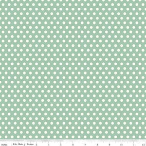 May include: A light green fabric with a white polka dot pattern. The dots are evenly spaced and cover the entire fabric.