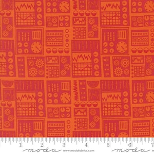 May include: Orange and red fabric with a repeating pattern of mechanical gauges, gears, and dials. The design includes various shapes and lines, creating a technical or industrial theme. The fabric has a ruler along the bottom edge.