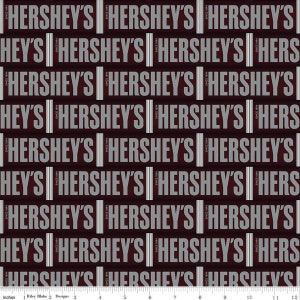 May include: A repeating pattern of the text "Hershey's" and "Hey's Hershey's" in a white font on a dark burgundy background. The text "Since 1894" appears in smaller white font next to the word "Hershey's".