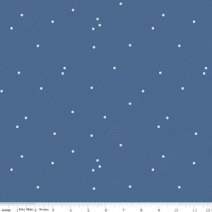 May include: A blue fabric with a white snowflake pattern. The snowflakes are scattered randomly across the fabric.