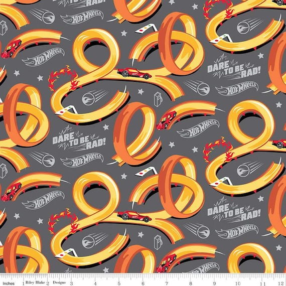 100% Cotton Licensed Fabric - Hot Wheels Badges - 43' 100% Cotton Licensed Fabric - Hot Wheels Badges - 43'