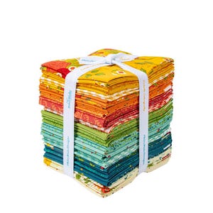 May include: A stack of colorful fabric squares, tied with a white ribbon. The fabric features floral and geometric patterns in shades of yellow, orange, red, green, and blue. The ribbon is printed with the text "Riley Blake Designs" and "Create Colorfully".