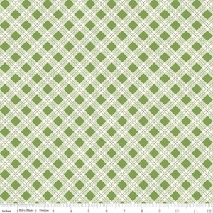 May include: Green and white plaid fabric with a diamond pattern. The fabric has a repeating design of green diamonds and white lines. The fabric is measured in inches.