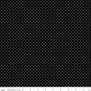 May include: Black fabric with a white polka dot pattern. The dots are evenly spaced and create a subtle, repeating design.