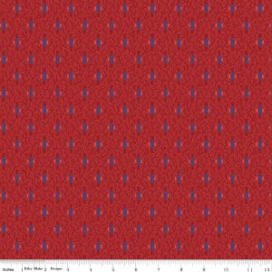 May include: Red fabric with a repeating pattern of small dots and vertical blue and pink shapes. The fabric has a textured appearance, with a subtle floral or leaf-like design woven throughout. The design is symmetrical and evenly spaced.