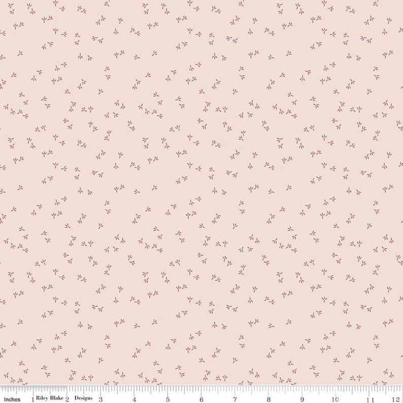 Image of Farmer's Daughter Chicken Tracks Background Tea Rose quilting cotton fabric by Lori Holt for Riley Blake Designs. Features chicken tracks on a cream background. Cute Little Fabric Shop
