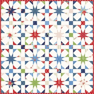 May include: A white quilt with a repeating pattern of red, blue, and green stars. The stars are surrounded by a variety of smaller patterned squares.