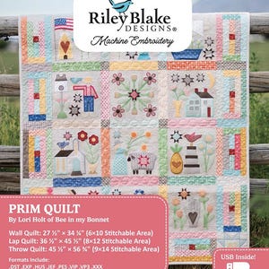 May include: A colorful quilt with various embroidered designs, including houses, birds, and flowers. The quilt features a patchwork design with a variety of pastel colors. The text "Riley Blake Designs" and "Prim Quilt" are visible. The wall quilt measures 27.5" x 34".