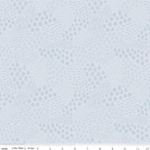 May include: A light blue fabric with a repeating pattern of small trees, stars, and wavy lines. The pattern is subtle and delicate, creating a calming and serene aesthetic.