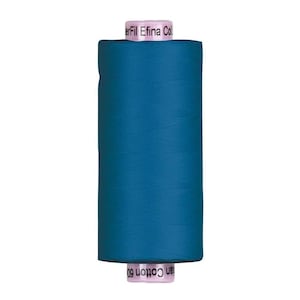 May include: A cylindrical spool of deep teal sewing thread. The spool features light pink end caps with printed text that reads WonderFil Efina Cotton 60. The thread is wound tightly around the central core, creating a smooth, solid color surface.