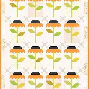 May include: A quilted fabric featuring a repeating pattern of stylized sunflowers. Each flower has an orange petal, a black center, and a green and yellow stem. The background is white with a subtle floral design.