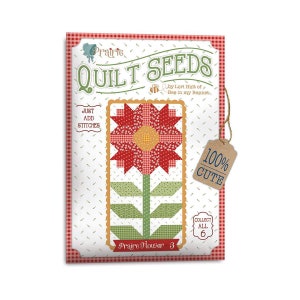 May include: A red and green quilt block pattern with a flower design. The block is titled "Prairie Flower 3" and is part of a quilt seed collection called "Quilt Seeds" by Lori Holt of Bee in my Bonnet.