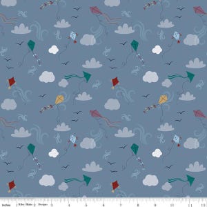 May include: A fabric pattern featuring a repeating design of colorful kites, clouds, and birds against a muted blue background. The kites are in various colors, including red, green, yellow, and blue. The pattern repeats across the fabric.