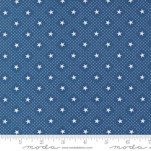 May include: Blue fabric with a white star and dot pattern. The fabric has a repeating design of white stars and small white dots on a blue background. The fabric is suitable for quilting, sewing, and crafting projects.