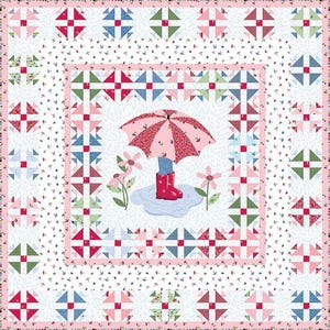 May include: A square quilt with a central illustration of an umbrella, rain boots, and flowers. The quilt features a pink border and a repeating pattern of squares in shades of pink, blue, and green. The background is white with small floral accents.