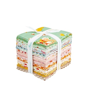 May include: A stack of folded fabric squares secured with a white ribbon printed with the text Riley Blake Designs. The fabric features various patterns in shades of green, pink, yellow, orange, and white, including floral and geometric motifs.