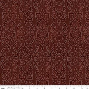 May include: A close-up of a fabric with a repeating damask pattern. The fabric is a deep burgundy color with a subtle sheen. The pattern is a lighter, stitched design of swirling floral and scroll motifs.