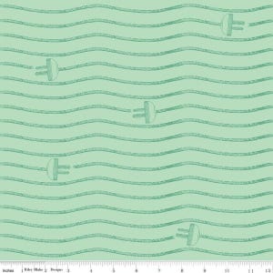 May include: A light green fabric with a repeating pattern of electrical plugs and wavy lines. The plugs are light gray and the lines are a darker shade of green. The ruler at the bottom measures up to 12 inches.