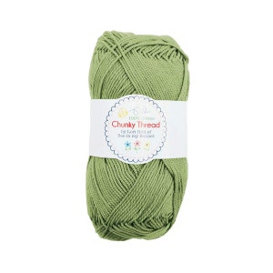 May include: A ball of green 100% cotton yarn labeled "Chunky Thread by Lori Holt of Bee in my Bonnet".