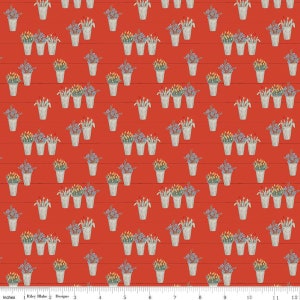 May include: A red background with a repeating pattern of three gray metal buckets with floral arrangements. The flowers are a mix of blue, yellow, and green.