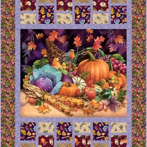 May include: A purple, blue, and green cabbage sits next to a cornucopia overflowing with fall harvest bounty, including pumpkins, gourds, apples, grapes, and corn. The cornucopia is surrounded by fall leaves and a small bluebird. The image is framed with a border of fall floral patterns.