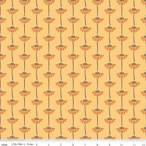 May include: A fabric pattern featuring vertical rows of stylized orange flowers with dark brown centers on a light yellow background. A white ruler at the bottom shows measurements in inches, with the text Riley Blake Designs visible.