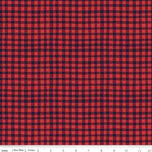 May include: Red and navy blue gingham fabric with a subtle textured pattern. The fabric is measured in inches.
