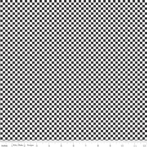 May include: Black and white checkered fabric with a repeating pattern of small squares. The fabric is measured in inches, with a ruler along the bottom edge. The text "Riley Blake Designs" is visible.