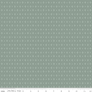May include: Sage green fabric with a repeating pattern of white arrow-like shapes and small dots. The design is arranged in a diamond grid, creating a textured appearance. The fabric is measured in inches.